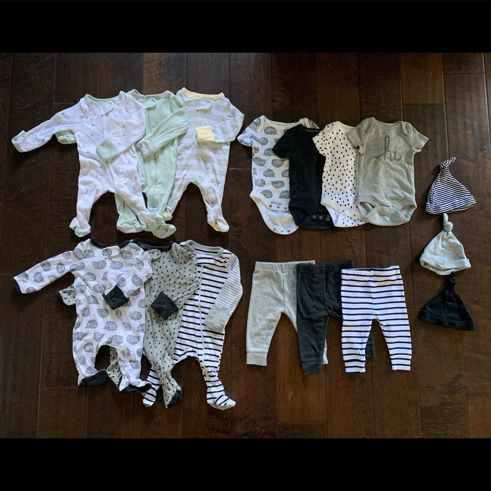 Newborn pajamas, matching onesies, pants and hats all new without tags